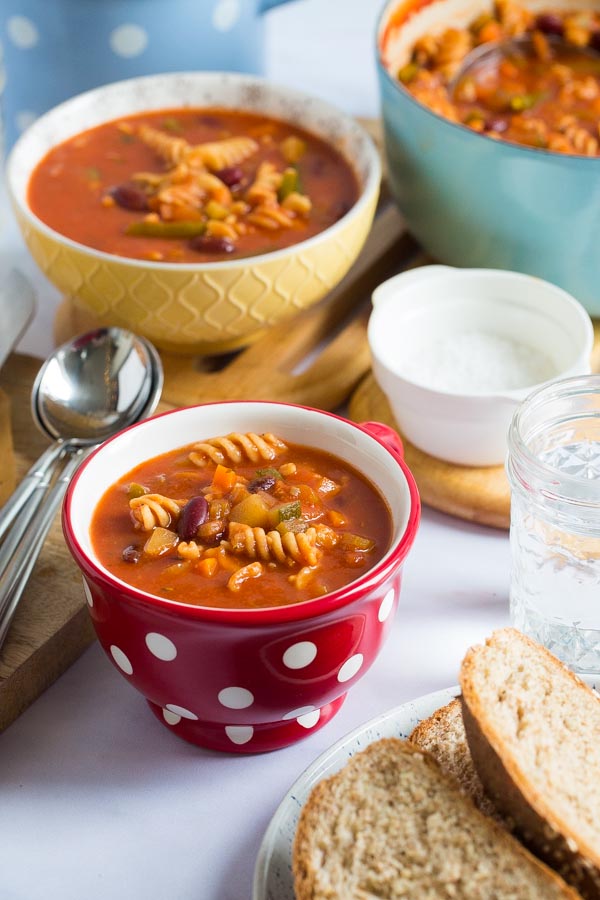Finding yourself with leftover vegetables? Try this easy and healthy one pot Minestrone Soup full of classic Italian flavours! #minestronesoup #minestrone #vegansoup #veganrecipes #souprecipe #vegetables #onepotmeal | Recipe on thecookandhim.com