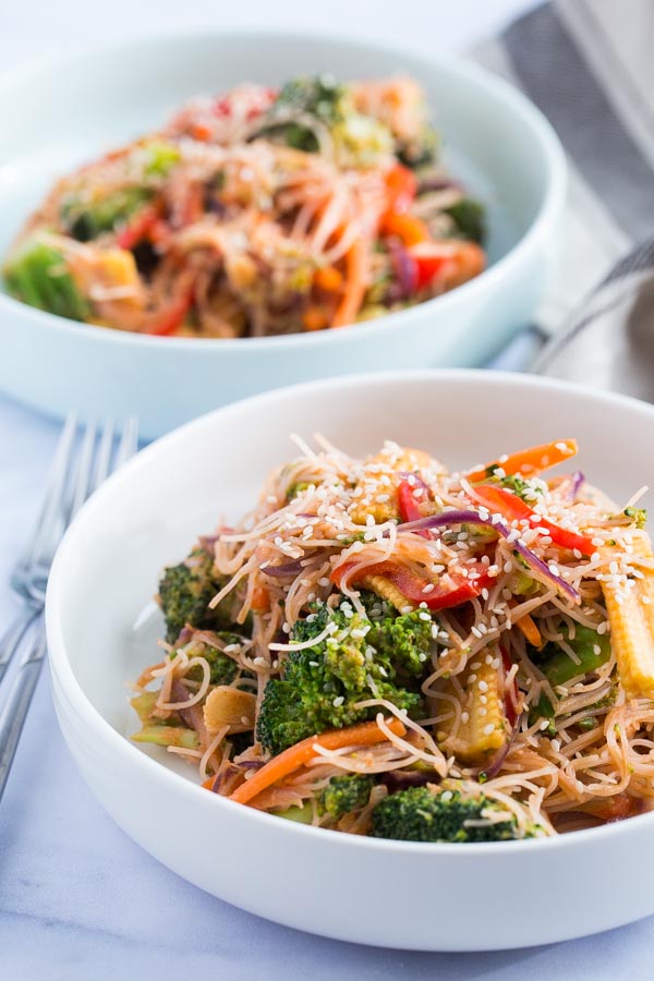 These deliciously easy Sesame Noodles and Veggies are a quick and healthy alternative to take out but taste just as good and can be served hot or cold for an easy weeknight meal or lunch! #sesamenoodles #veggienoodles #coldsesamenoodles #vegetablelowmein #vegetablechowmein | Recipe on thecookandhim.com