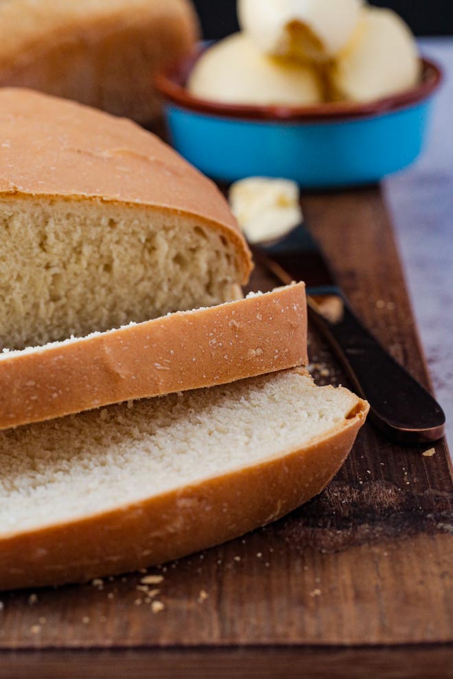 There's nothing like the smell of a freshly baked loaf and it couldn't be easier to make with this white bread recipe. Only a few store cupboard ingredients needed for perfect bread every time! #homemadebread #veganrecipes #veganbread #whitebreadrecipe #easybreadrecipe #whiteloaf | Recipe on thecookandhim.com