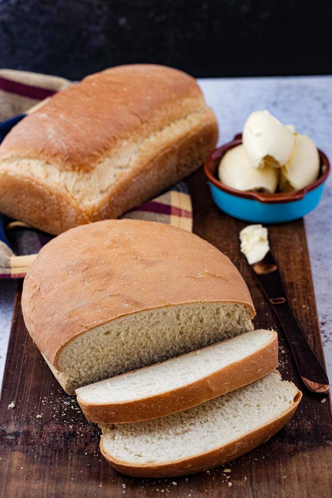 There's nothing like the smell of a freshly baked loaf and it couldn't be easier to make with this white bread recipe. Only a few store cupboard ingredients needed for perfect bread every time! #homemadebread #veganrecipes #veganbread #whitebreadrecipe #easybreadrecipe #whiteloaf | Recipe on thecookandhim.com
