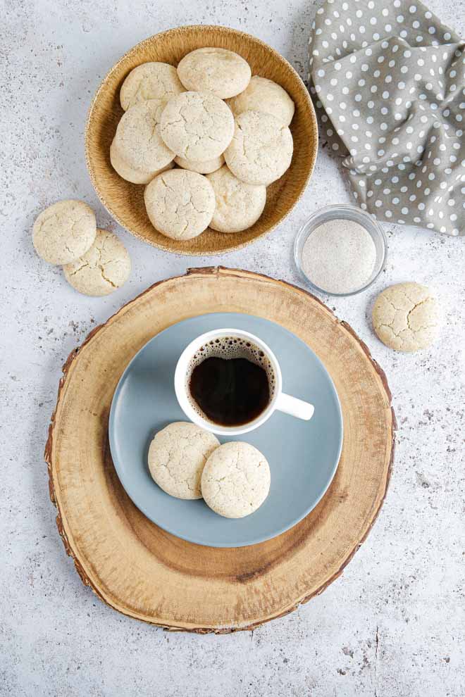 Only a few simple ingredients are needed to make these soft cream cheese cookies. They're coated in crunchy cinnamon sugar before being baked to chewy perfection! #vegancookies #vegancheese #veganbaking #creamcheesecookies #cinnamon #cinnamonsugar #cinnamonsugarcookies | Recipe on thecookandhim.com