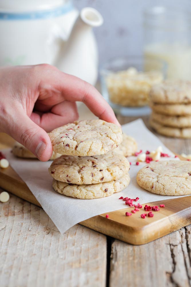 Sweet, fruity, chewy, gooey and delicious these white chocolate raspberry cookies are SO easy to whip together for the perfect sweet treat! #whitechocolatecookies #vegancookies #veganbaking #vegansnack #veganrecipes #vegan #veganchocolate