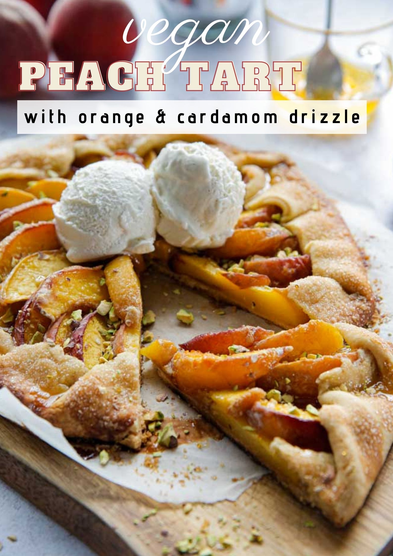 This easy, vegan peach tart is summer in every bite! Super simple homemade pastry brimming with fresh, juicy peaches served warm with a sweet orange and cardamom drizzle | recipe on thecookandhim.com | #vegan #vegandessert #peachtart #summertart #peaches #veganbaking #veganrecipe #veganpastry