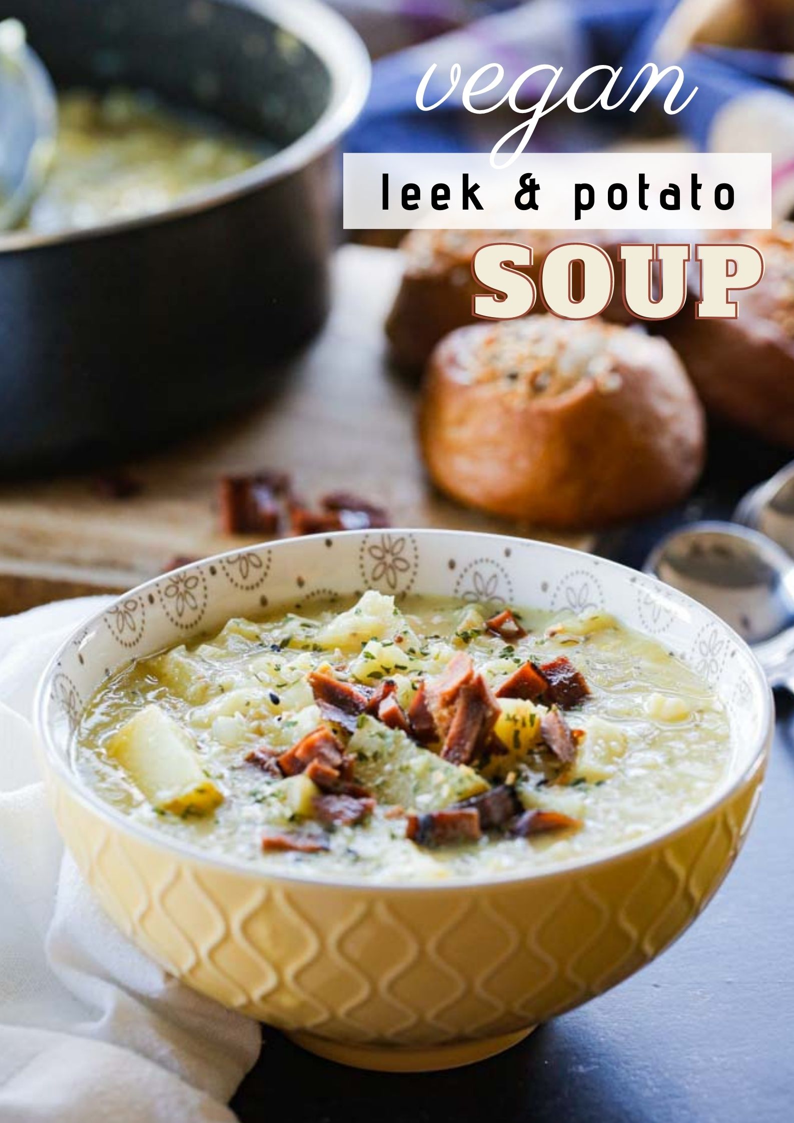 Baby potatoes, fragrant leeks, herbs, garlic, apple cider and vegan cheese are all in this easy, rich and hearty soup. Add crumbled vegan bacon bits for a crispy, salty topping, turning this leek and potato soup into pure comfort food heaven! Recipe on thecookandhim.com | #leekandpotatosoup #homemadesoup #healthysoup #vegansoup #soup #souprecipe #leekrecipes #potatorecipes #wintersoup
