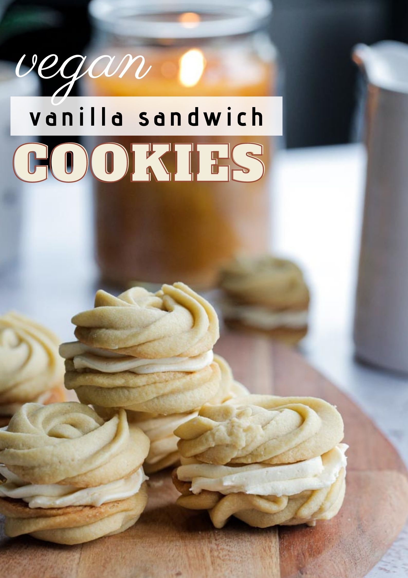 Soft, buttery and melt in the mouth these vegan vanilla sandwich cookies filled with vanilla buttercream are an easy to bake delicate little treat! Recipe on thecookandhim.com #vegancookies #veganbaking #vanillacookies #sandwichcookies #vanilla #veganrecipes