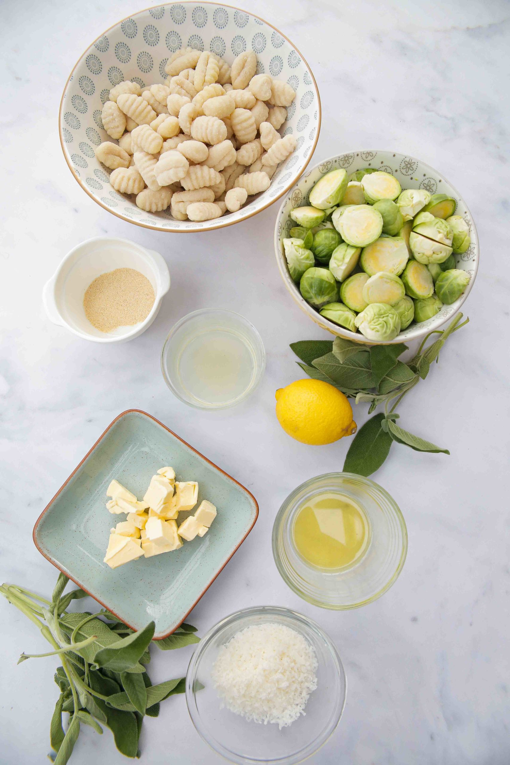 Crispy pan fried gnocchi with tender Brussel's sprouts, hints of lemon and garlic in a rich sage butter sauce. All cooked in one pan for an easy and speedy lunch or cozy evening meal made with just a few, simple ingredients but absolutely full of flavour.