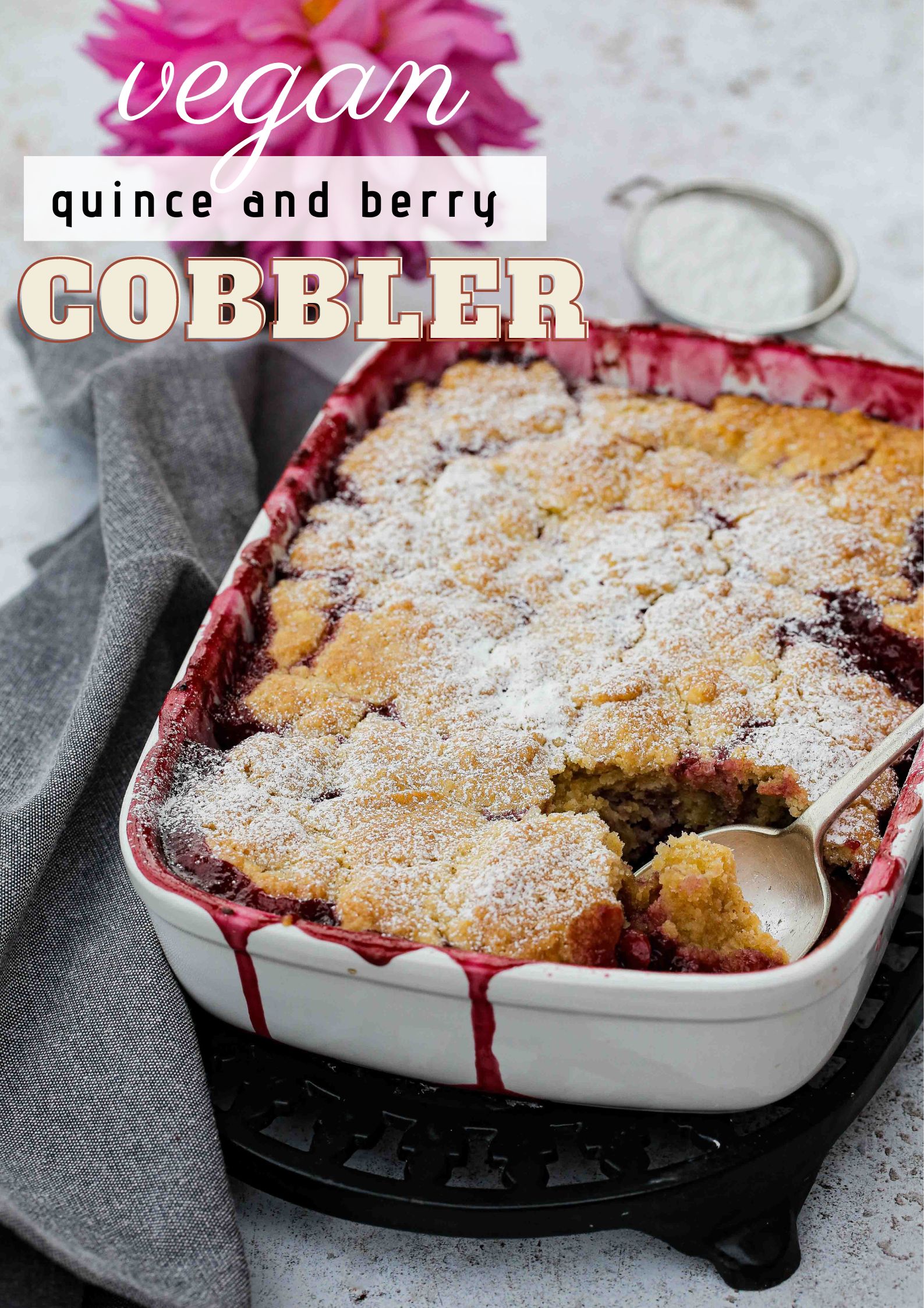 Ripe quince and juicy berries cooked in a sticky sweet syrup then topped with a rich, buttery and crisp cobbler. Perfect for using up any frozen summer berries. Just add vanilla ice cream for the perfect autumn dessert | Recipe on thecookandhim.com #veganbaking #vegandessert #veganrecipes #cobblerrecipe #fruitcobbler #quincerecipes