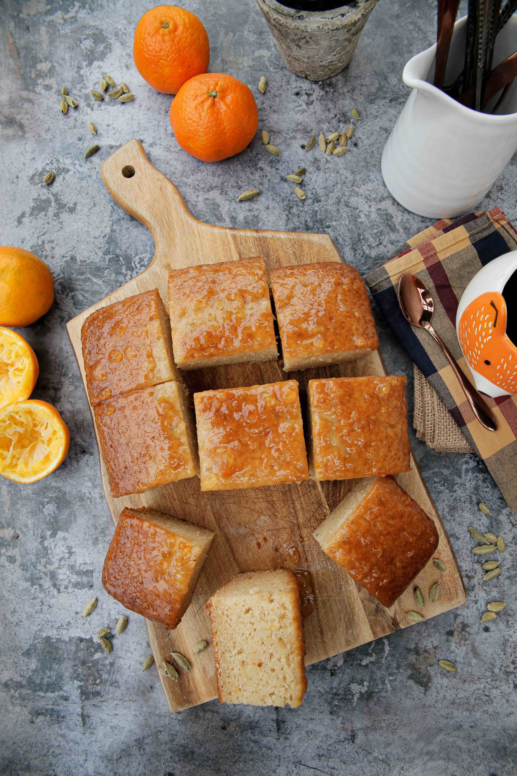 A delightfully easy to make marmalade cake recipe with beautiful zesty flavours and a sticky, sweet topping | Recipe on thecookandhim.com #marmaladecake #vegancake #veganbaking