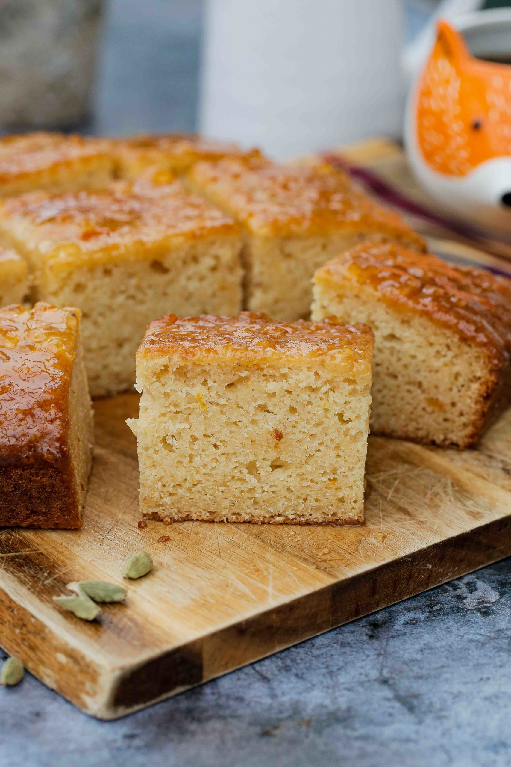 A delightfully easy to make marmalade cake recipe with beautiful zesty flavours and a sticky, sweet topping | Recipe on thecookandhim.com #marmaladecake #vegancake #veganbaking