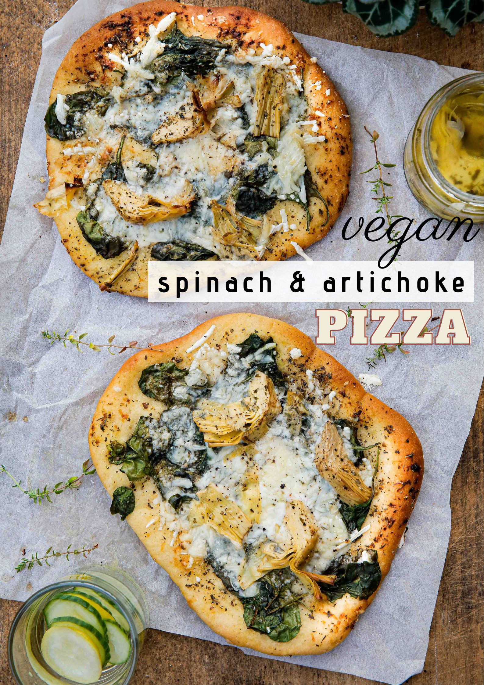 Garlicky, herby and cheesy this vegan spinach and artichoke pizza is so easy to make, so much cheaper than takeaway and beyond delicious! Recipe on thecookandhim.com #veganpizza #pizzarecipe #homemadepizza