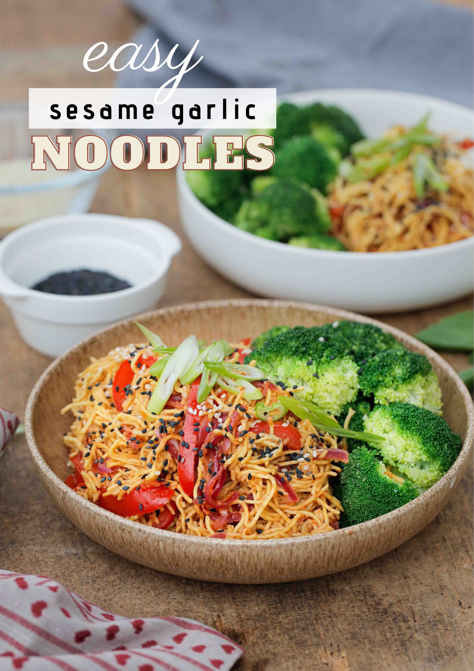 These garlic sesame noodles are healthy, vegan and take just 15 minutes to make! And with just a few store cupboard ingredients they're perfect for busy days | Recipe on thecookandhim.com #noodles #vegan #recipe #sesamegarlicnoodles #sesamenoodles #chowmein #stirfry #easydinner #easymeal #easymealideas