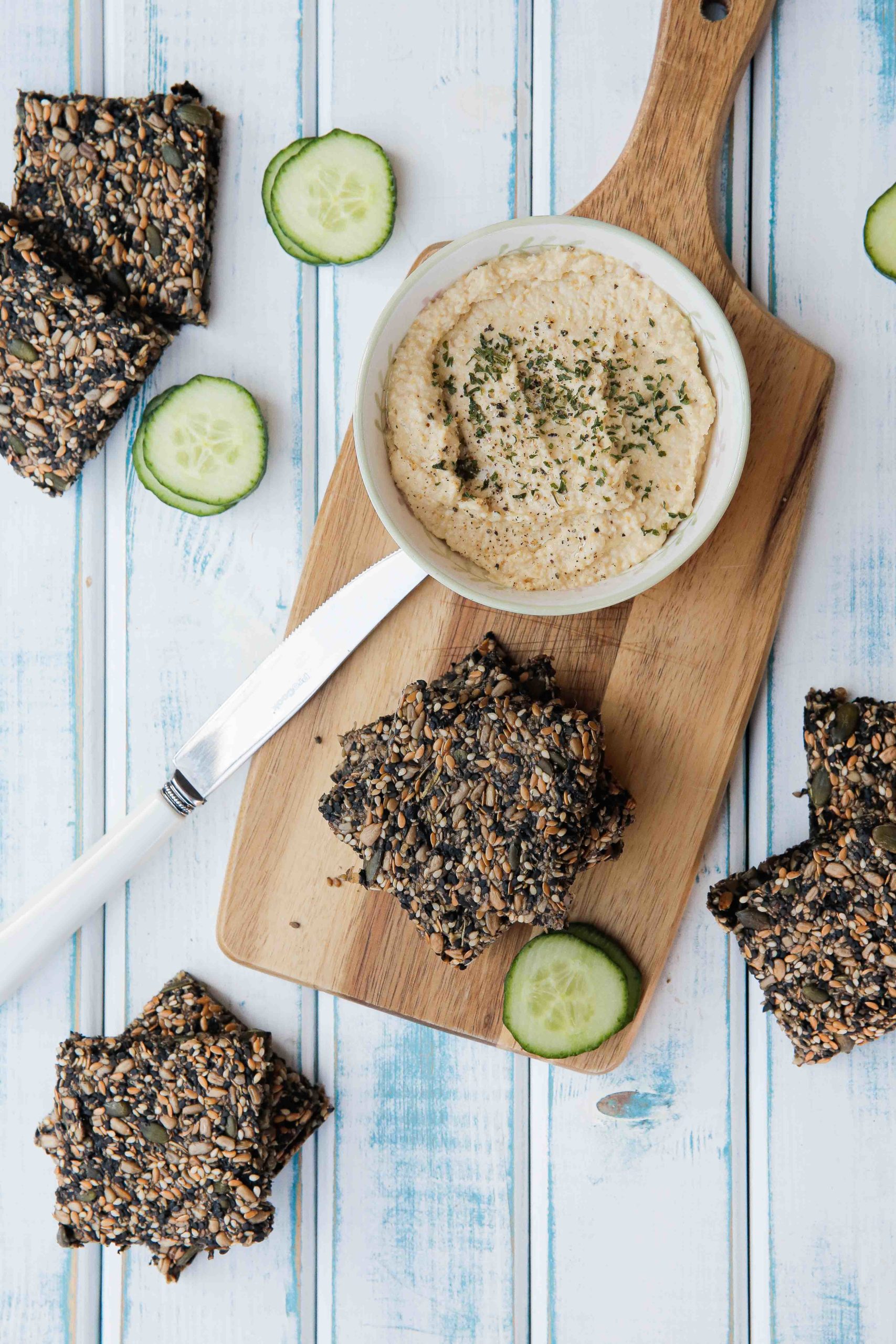 A simple and easy seaweed snacks recipe, these healthy little crackers are full of seeds and crunchy flavour! So simple to make and perfect for mid morning hungries or after school snacks! Recipe on thecookandhim.com #seaweedsnacksrecipe #healthysnacks #healthycrackers