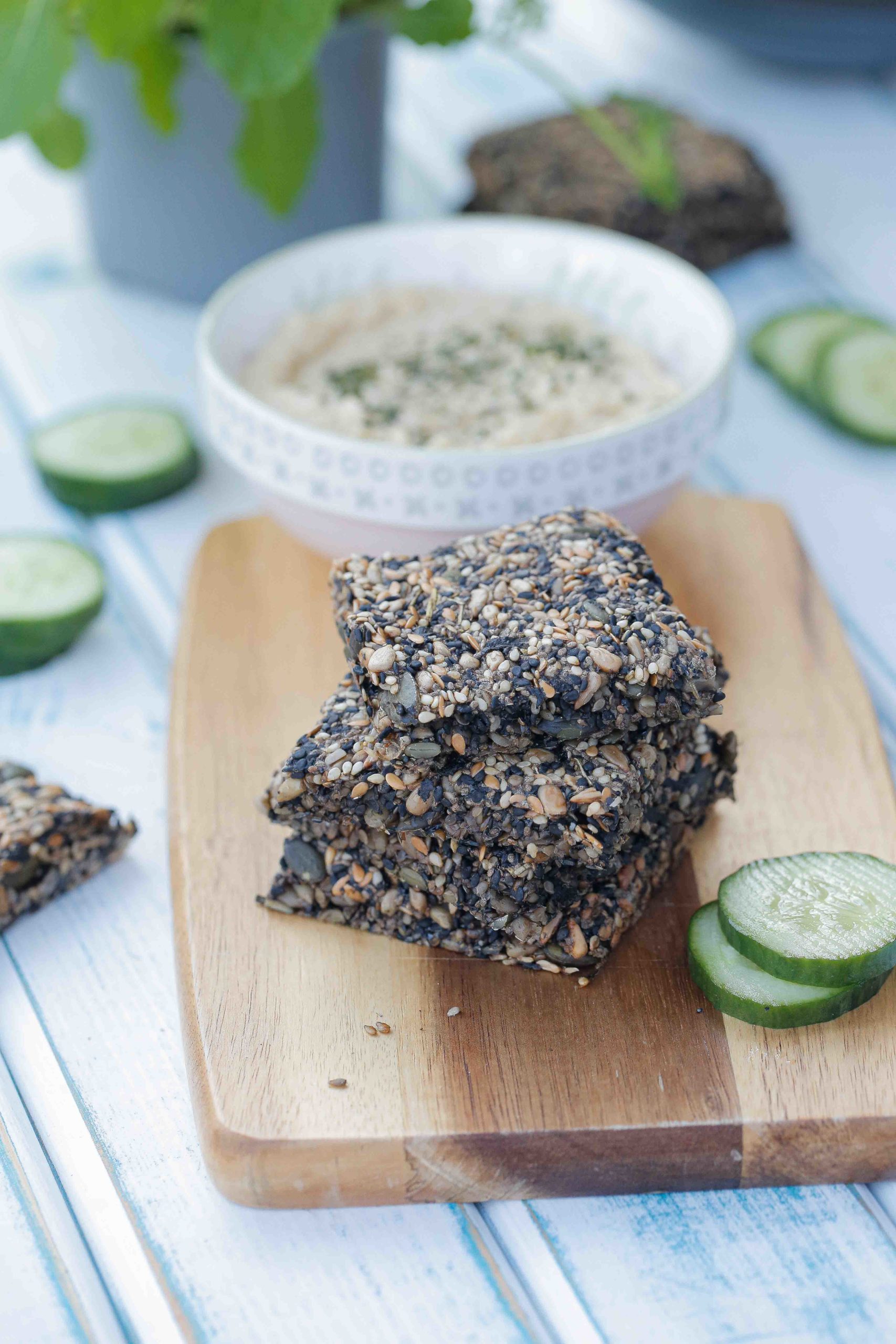 A simple and easy seaweed snacks recipe, these healthy little crackers are full of seeds and crunchy flavour! So simple to make and perfect for mid morning hungries or after school snacks! Recipe on thecookandhim.com #seaweedsnacksrecipe #healthysnacks #healthycrackers