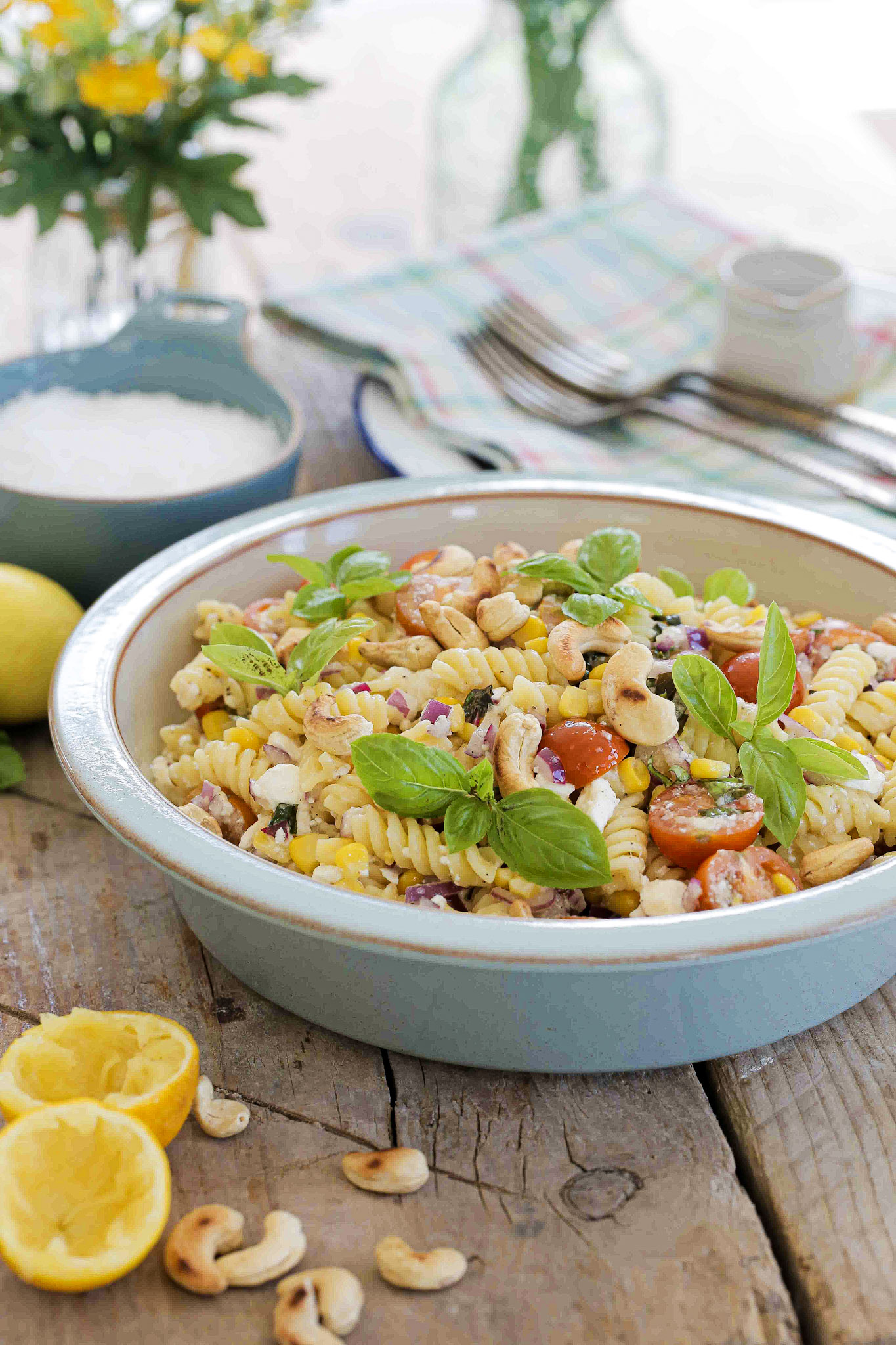 Bright and fresh Italian summer pasta salad perfect for picnics, pot lucks and lunchboxes! Super easy to make and just as delicious warm or cold. Lots of fresh veggies and herbs along with tangy vegan feta and a simple pasta salad dressing. Recipe on thecookandhim.com #pastasalad #summerpastasalad #vegansalad #pastarecipes #italianpastasalad #easypastasalad #healthydinner #summermeals #picnicfood #easylunchboxideas