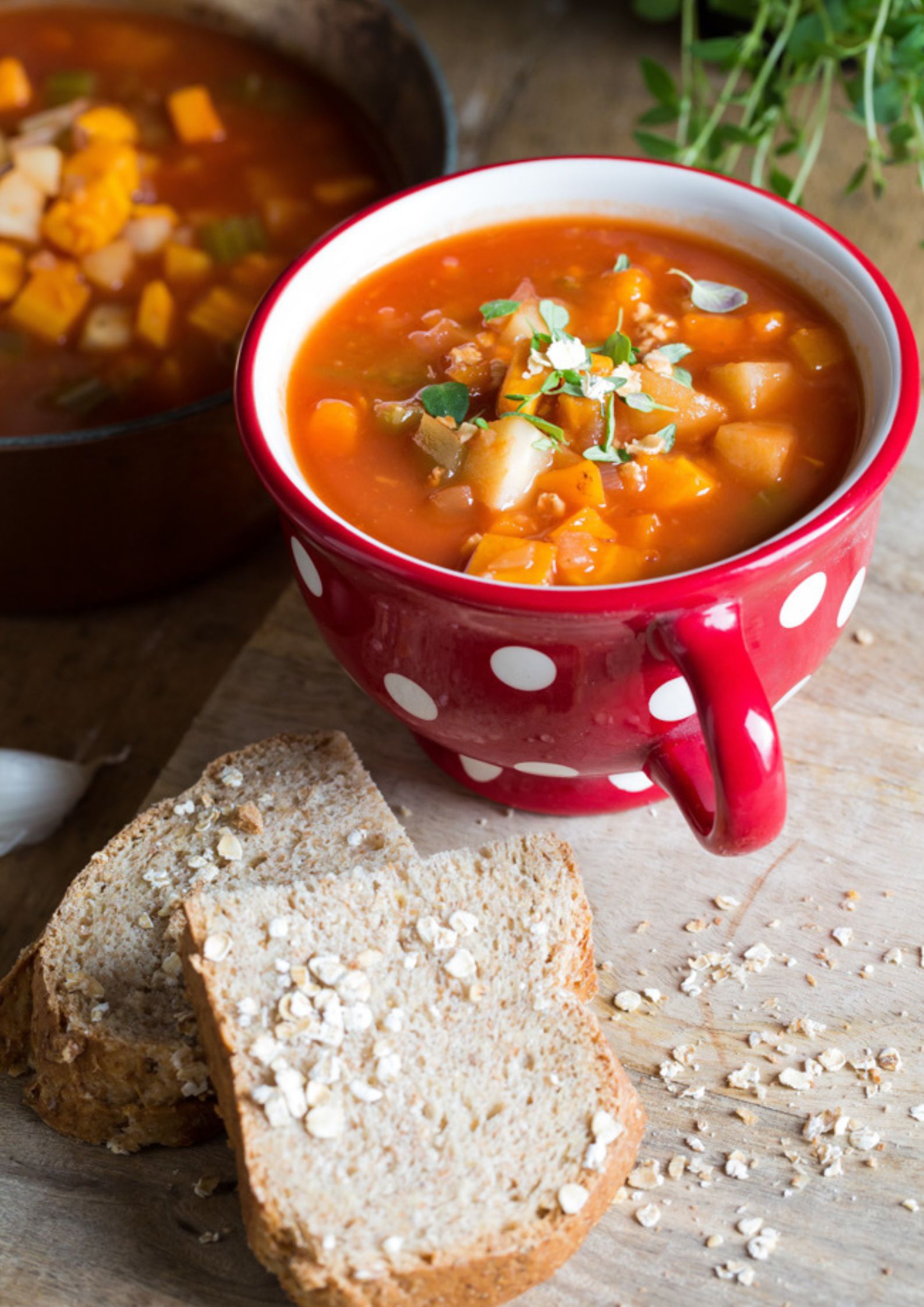 Made with store cupboard staples and vegetable leftovers this hearty chunky vegetable soup is a warming, easy meal with a delicious combination of flavours. Recipe on thecookandhim.com | #vegetablesoup #veggiesoup #vegansoup #chunkysoup #autumnrecipes #winterrecipes