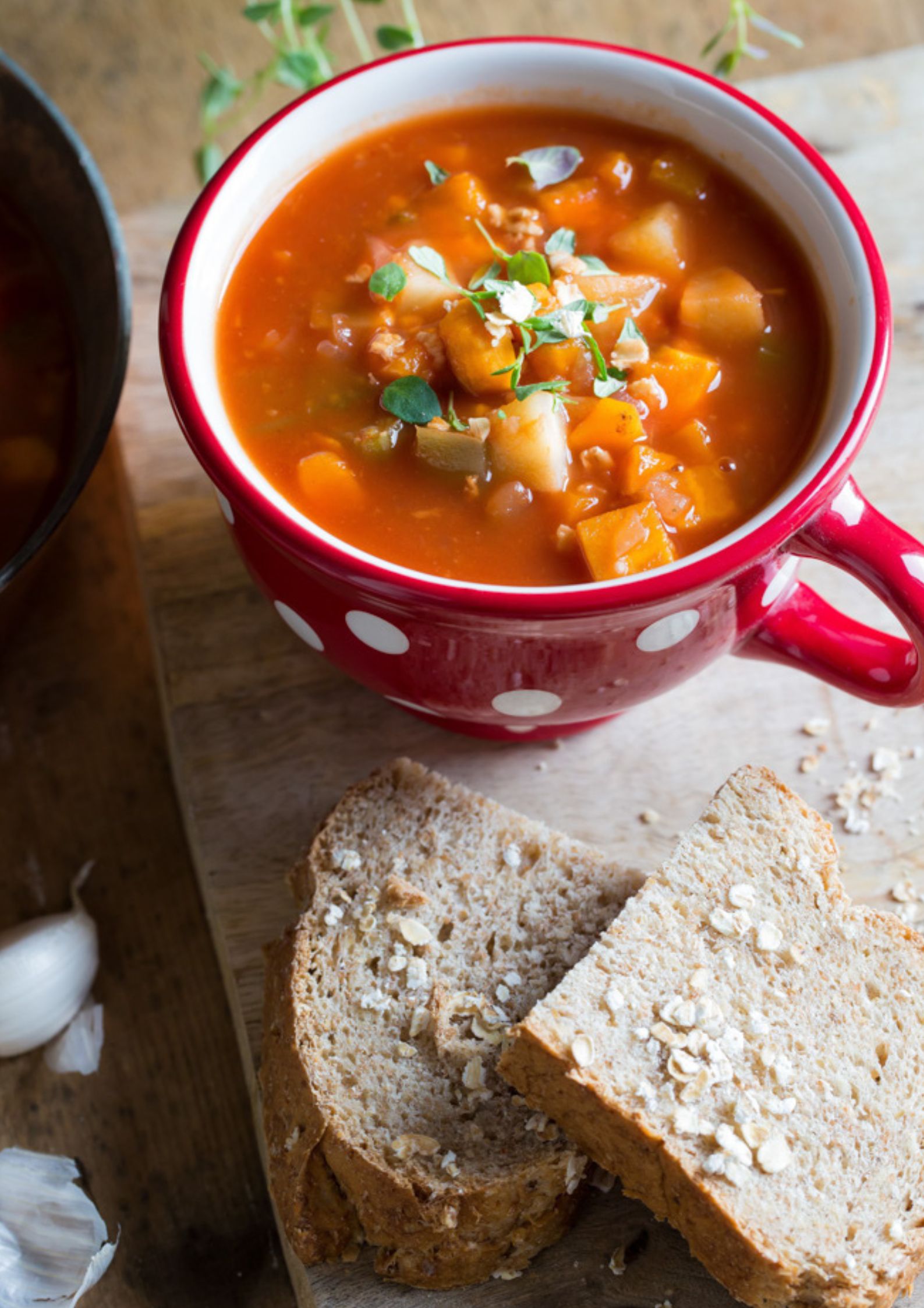 Made with store cupboard staples and vegetable leftovers this hearty chunky vegetable soup is a warming, easy meal with a delicious combination of flavours. Recipe on thecookandhim.com | #vegetablesoup #veggiesoup #vegansoup #chunkysoup #autumnrecipes #winterrecipes
