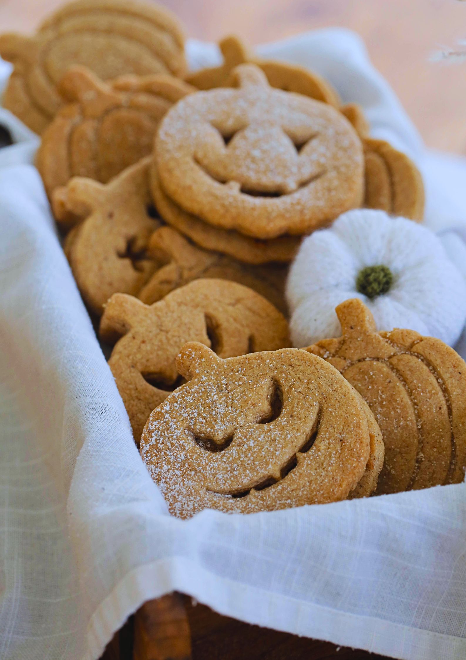 Buttery vegan shortbread flavoured with pumpkin spice make these Halloween cookies frightfully delicious! An easy Halloween treat for all ages | Recipe on thecookandhim.com #halloweencookies #pumpkinspice #veganhalloween