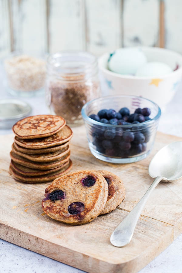 Spoil your furry friend with these doggy pancakes. Made with simple, healthy ingredients they're super easy and your pup with absolutely love these homemade dog treats! Recipe on thecookandhim.com | #homeamadedogtreats #doggypancakes #pancakesfordogs #healthydogtreats