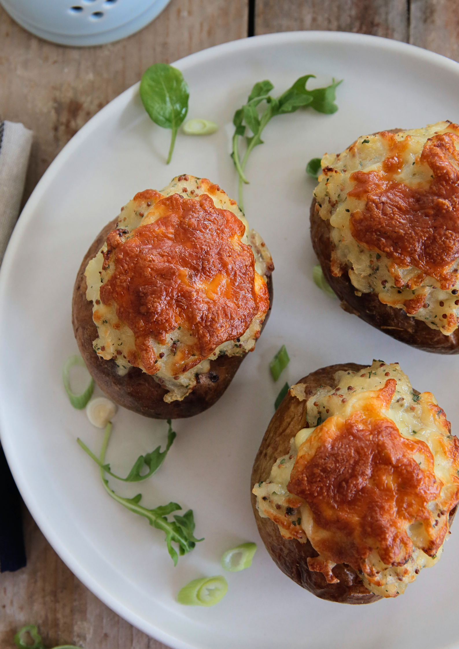 Vegan shepherds pie twice baked potatoes combines two great comfort foods for a make ahead lunch or hearty dinner when paired with extra veggies or crisp salad! #ovenbakedpotatoes #potatorecipes #twicebakedpotatoes #veganshepherdspie