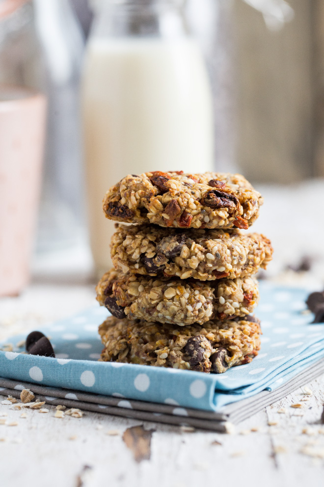 If you like oatmeal cookies, you're going to love this healthier version of a classic! They're chewy, naturally sweetened and packed with heart healthy seeds. Oh and they're deliciously moreish too! #oatmealcookies #glutenfreebaking #oatcookies #vegancookies #glutenfreecookies