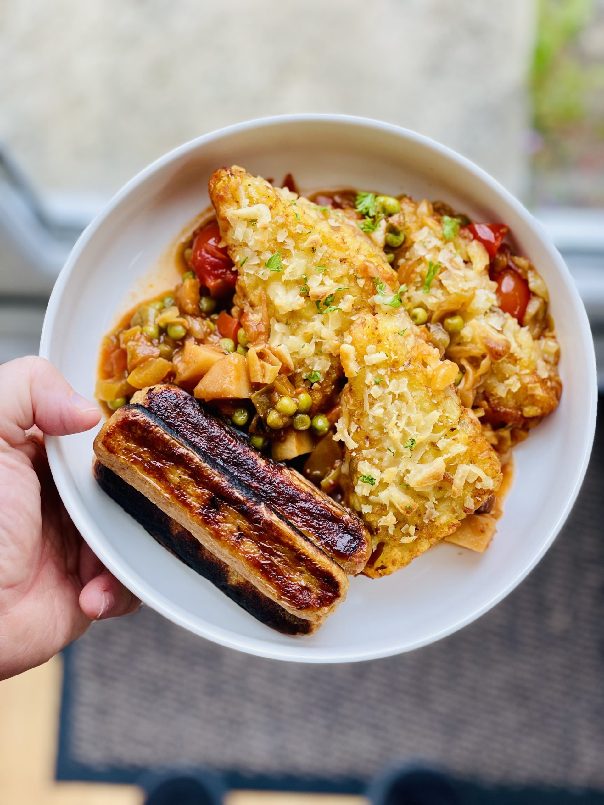 Packed with veggies in a rich and spicy tomato and gochujang sauce, topped with hash browns and baked to crispy perfection this is easy, hearty and warming comfort food.