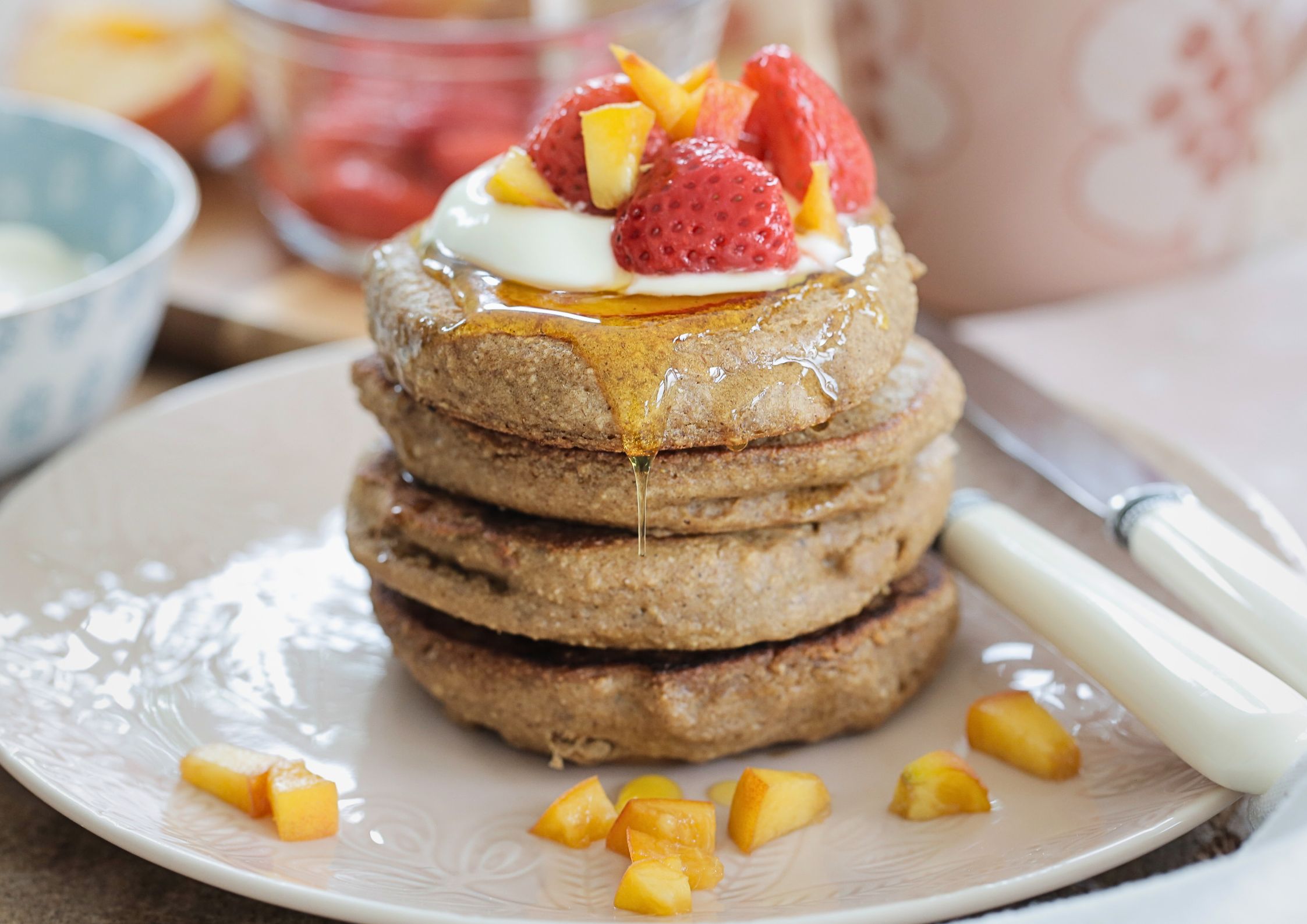 Gluten free vegan peach pancakes - light, fluffy, fruity and the perfect easy summer breakfast