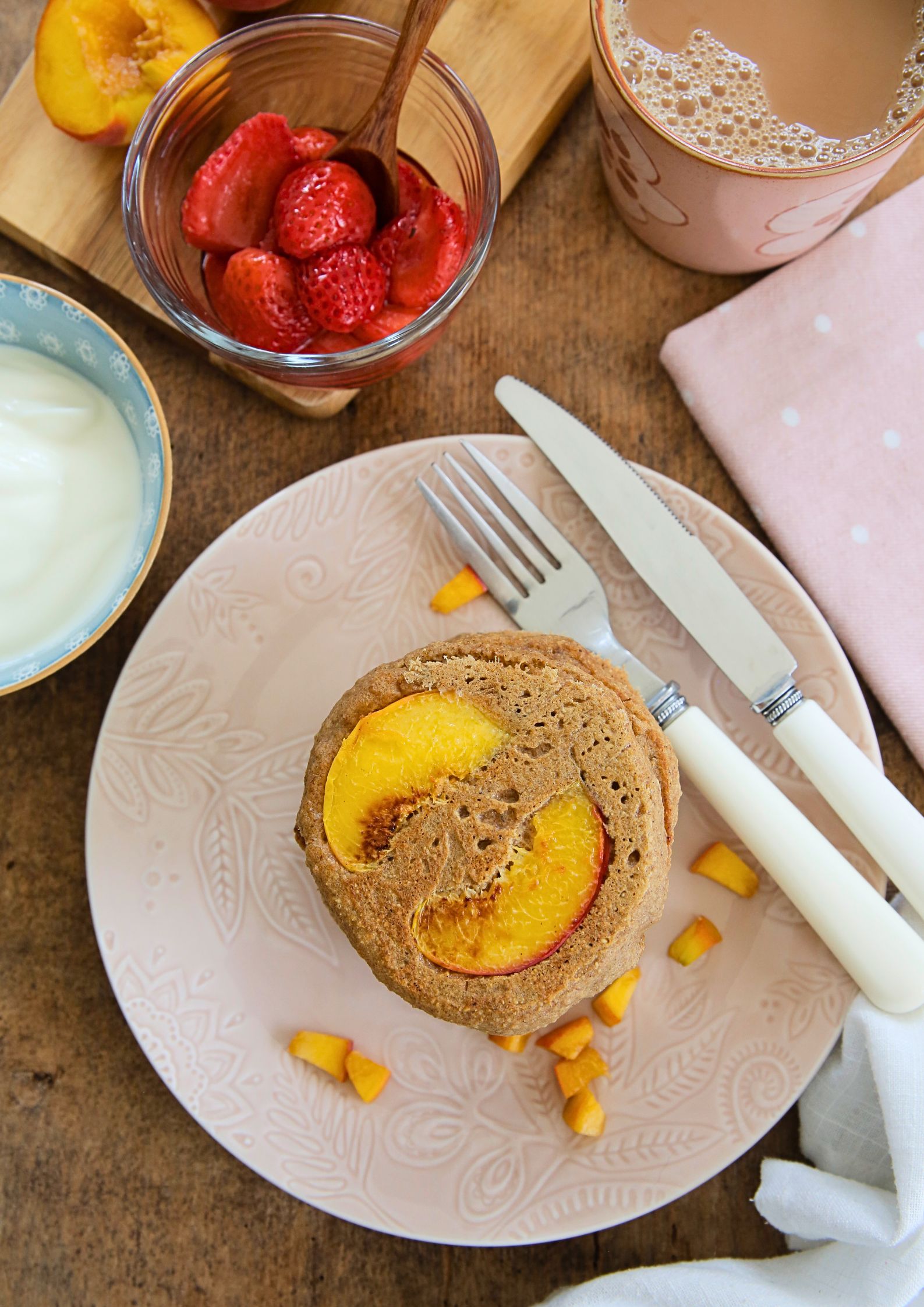 Gluten free vegan peach pancakes - light, fluffy, fruity and the perfect easy summer breakfast