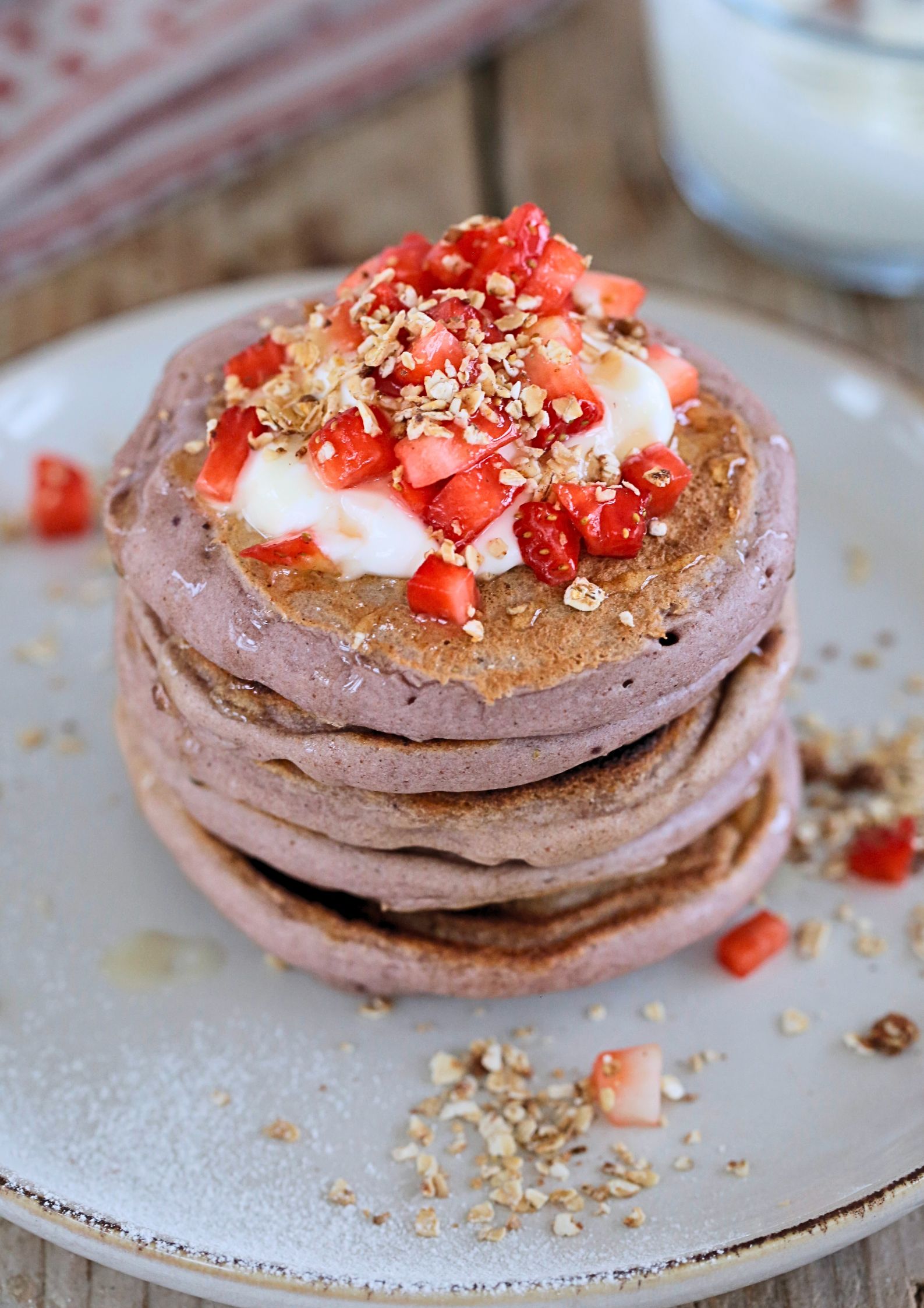 Worth getting out of bed for, these crisp, fluffy vegan strawberry pancakes are blended with fresh strawberries in the pancake batter as well as extra sliced strawberries added as you cook them. Serve with vegan yoghurt and a drizzle of maple syrup for a perfect plant based breakfast